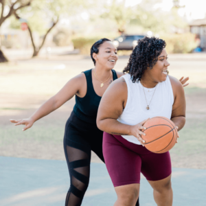 Physical Wellness Example: Two People Playing Basketball